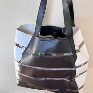 Vince Camuto tote , NY . Excellent for travel , gym , paperwork.Very clean,mint